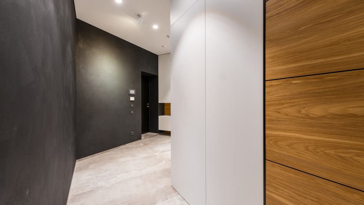 Sleek modern hallway with wood paneling and minimalist design, perfect for contemporary interiors.